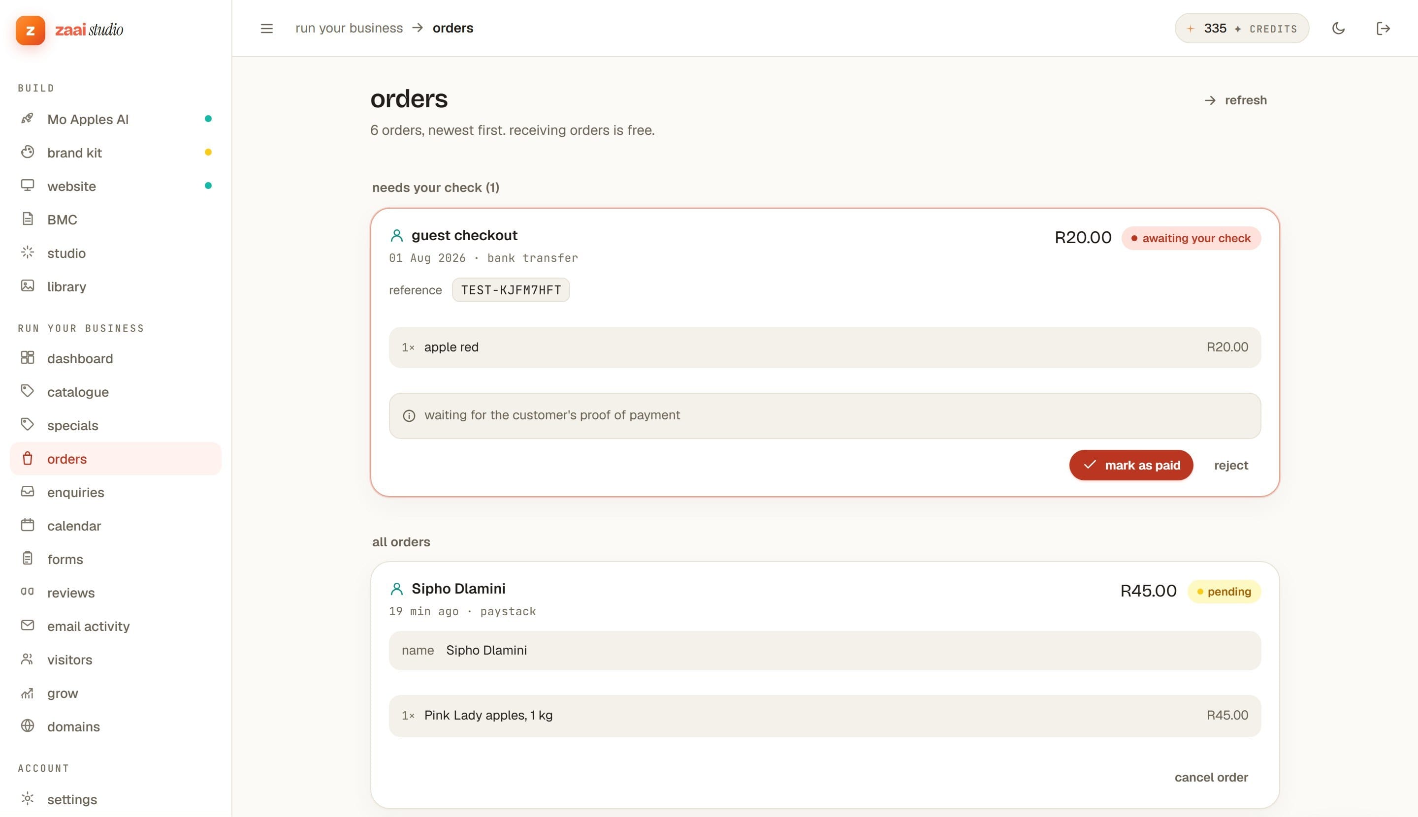 The Zaai Studio orders screen: an order awaiting a bank-transfer check with mark-as-paid, and a pending Paystack order below it.